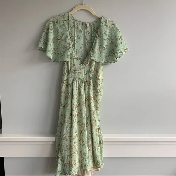 uo green dress UO stargazer lace up back mini dress
